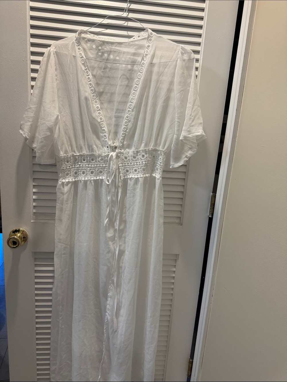 White Lace-Trim Sheer Maxi Robe or bathing suit coverup.